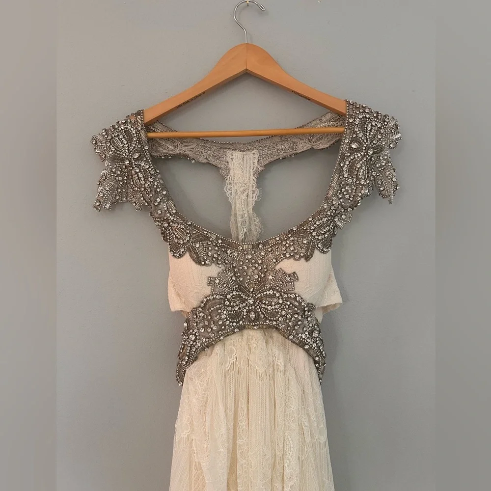 Exquisite Cream and Silver Embellished Wedding Gown - Picture 2 of 5